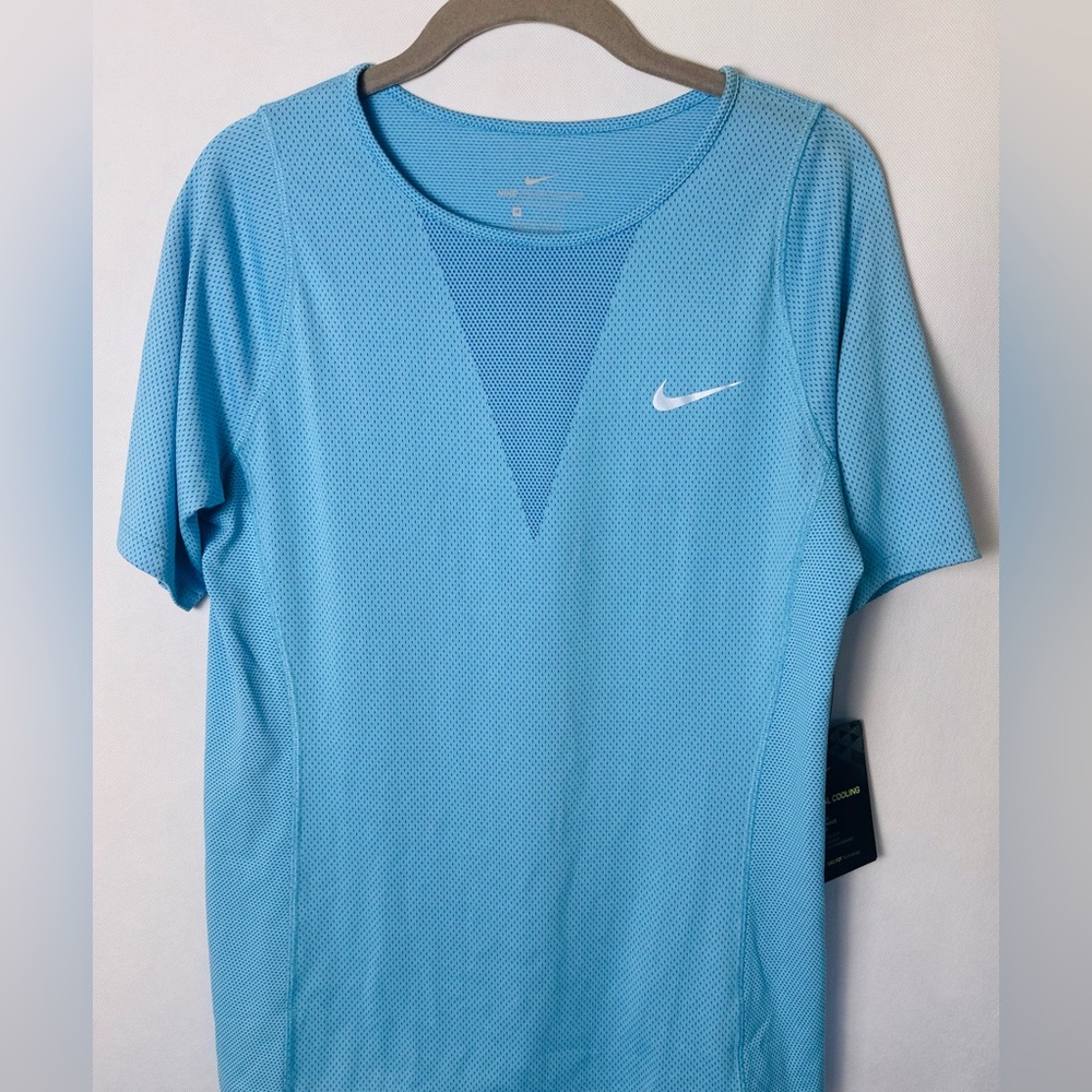 Women’s light blue relaxed fit athletic shirt - size medium
